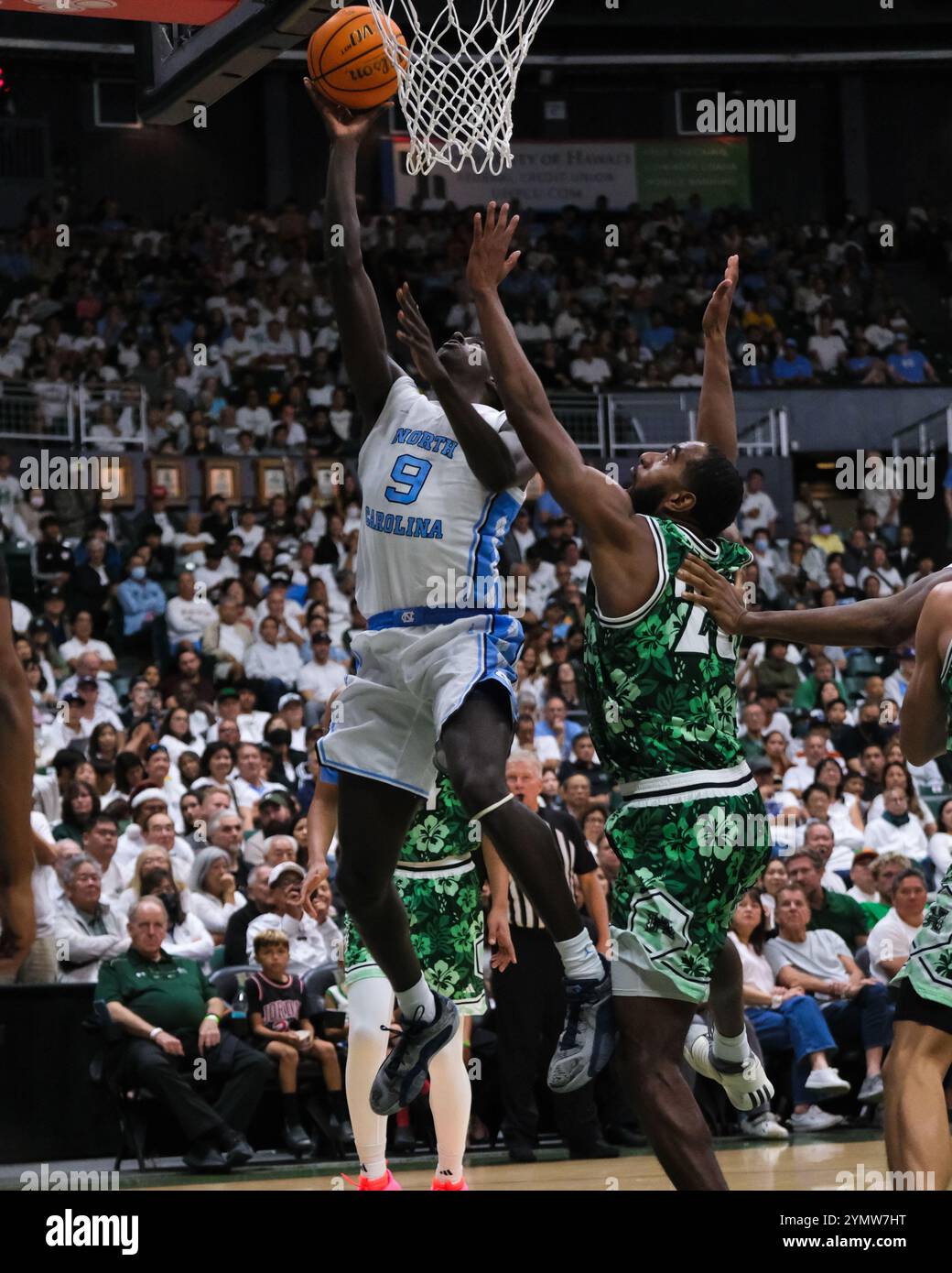 Honolulu, Hawaii, Stati Uniti. 22 novembre 2024. La guardia del North Carolina Drake Powell (9) spara la palla durante la partita di basket NCAA del 2024 tra i North Carolina Tar Heels e i Rainbow Warriors della University of Hawaii alla SimpliFi Arena allo Stan Sheriff Center di Honolulu, Hawaii. Glenn Yoza/CSM (immagine di credito: © Glenn Yoza/Cal Sport Media) (immagine di credito: © Glenn Yoza/Cal Sport Media). Crediti: csm/Alamy Live News Foto Stock