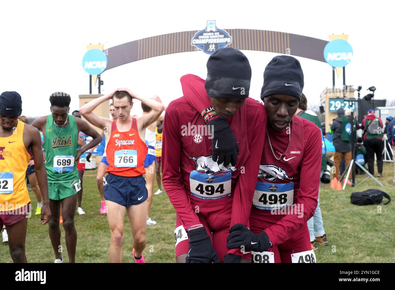 Madison, Wisconsin, Stati Uniti. 23 novembre 2024. Patrick Kiprop (494) e Kirami Yego (498) reagiscono dopo la gara maschile durante i campionati NCAA di fondo al Thomas Zimmer Championship Course, sabato 23 novembre 2024, a Madison, Wisc. Crediti: Kirby Lee/Alamy Live News Foto Stock