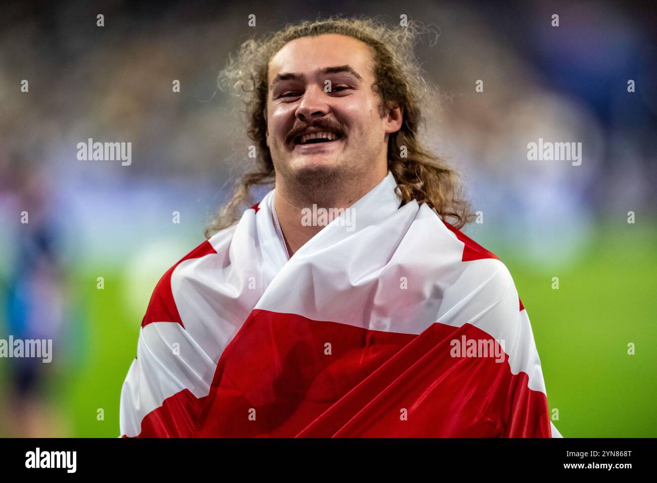 Ethan Katzberg (CAN), vince la medaglia d'oro nel lancio del martello maschile ai Giochi Olimpici estivi del 2024. Foto Stock