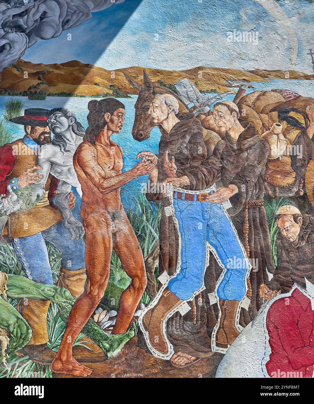 Dettagli murali che mostrano i bianchi che donano jeans Levis ritagliati ai nativi americani. Su un muro di un edificio nella zona di Piedmont Street di Oakland, California. Foto Stock
