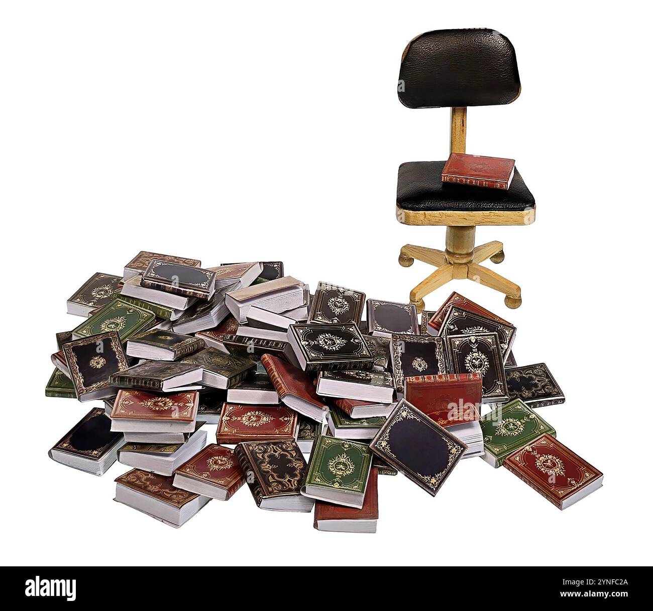 Una varietà di libri diversi in un set impilato sul pavimento con una sedia da ufficio Foto Stock
