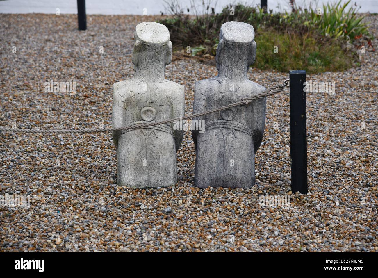 Statue sulla spiaggia Foto Stock