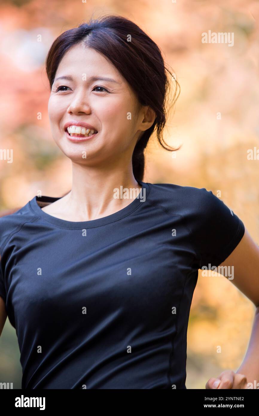 Donna in abbigliamento sportivo Foto Stock