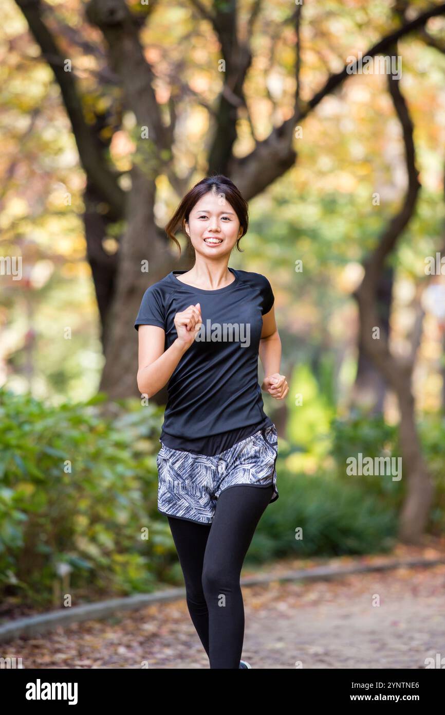 Donna in abbigliamento sportivo Foto Stock