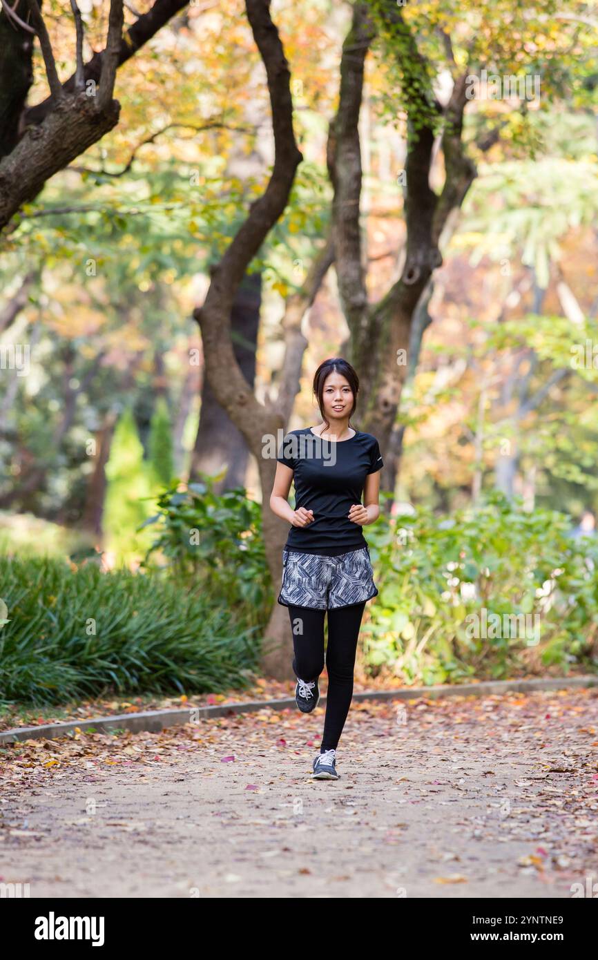 Donna in abbigliamento sportivo Foto Stock