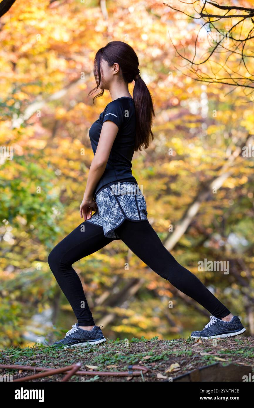 Donna in abbigliamento sportivo Foto Stock