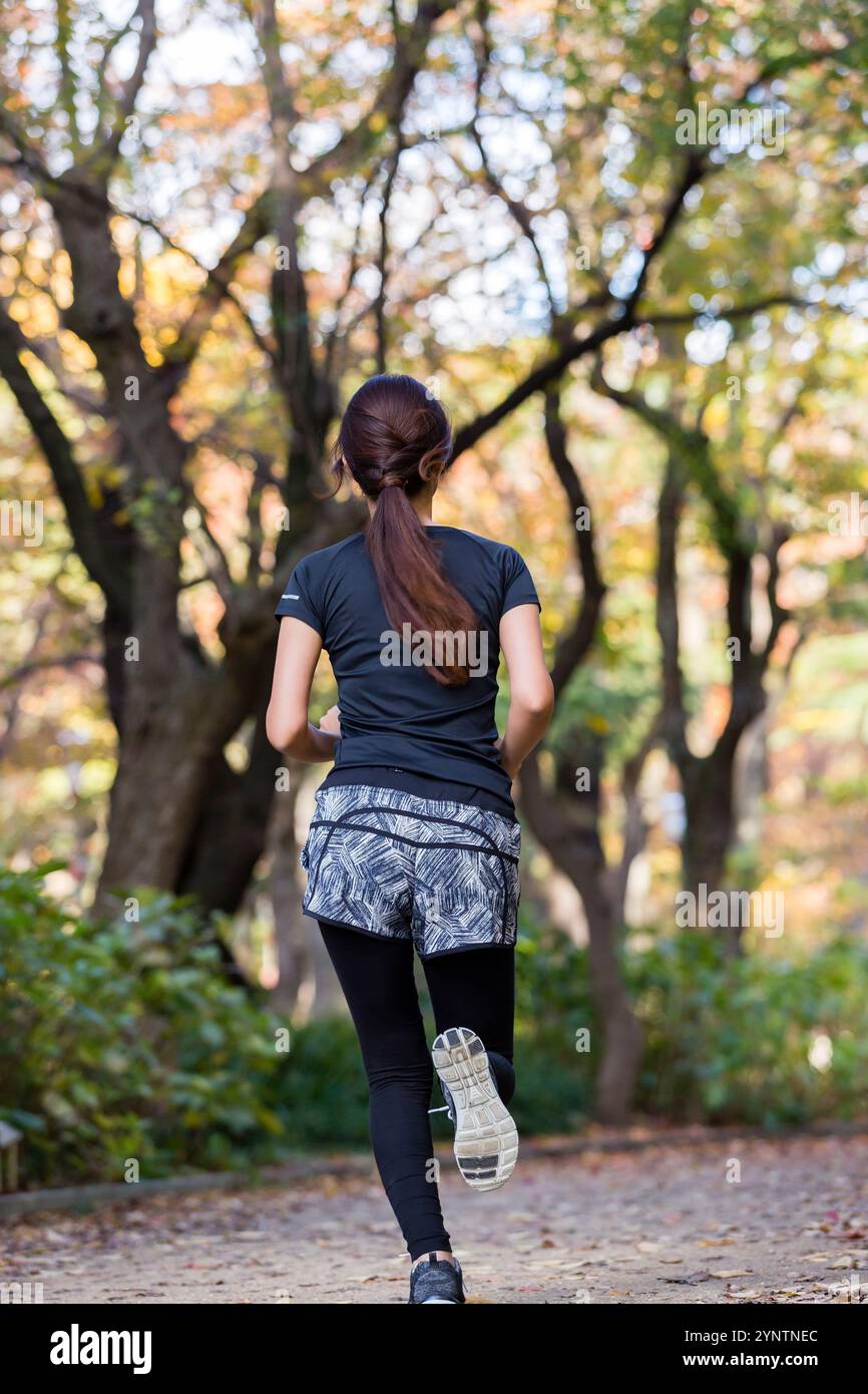 Donna in abbigliamento sportivo Foto Stock