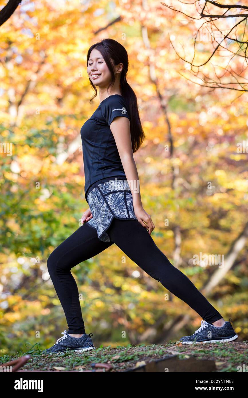 Donna in abbigliamento sportivo Foto Stock