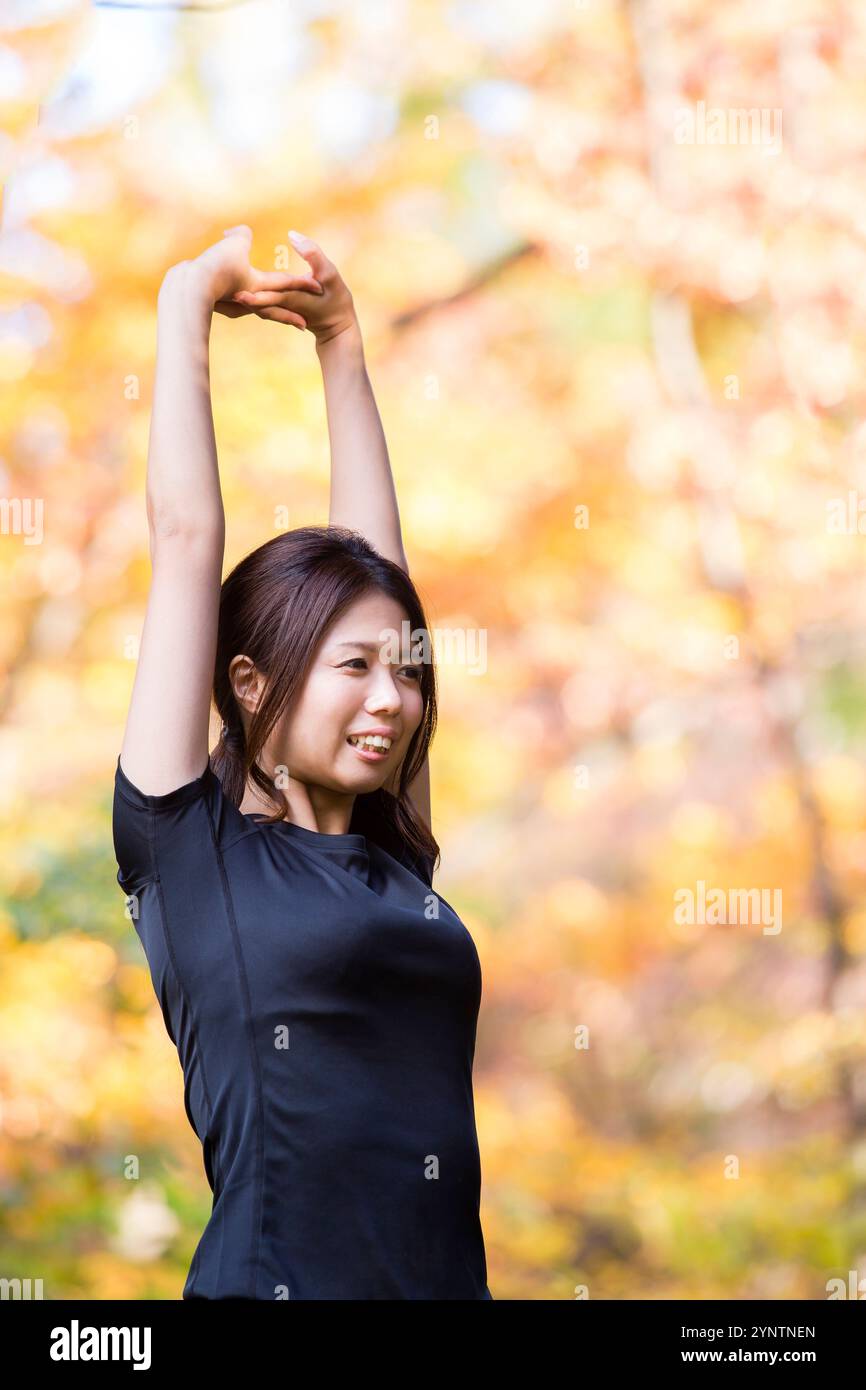 Donna in abbigliamento sportivo Foto Stock