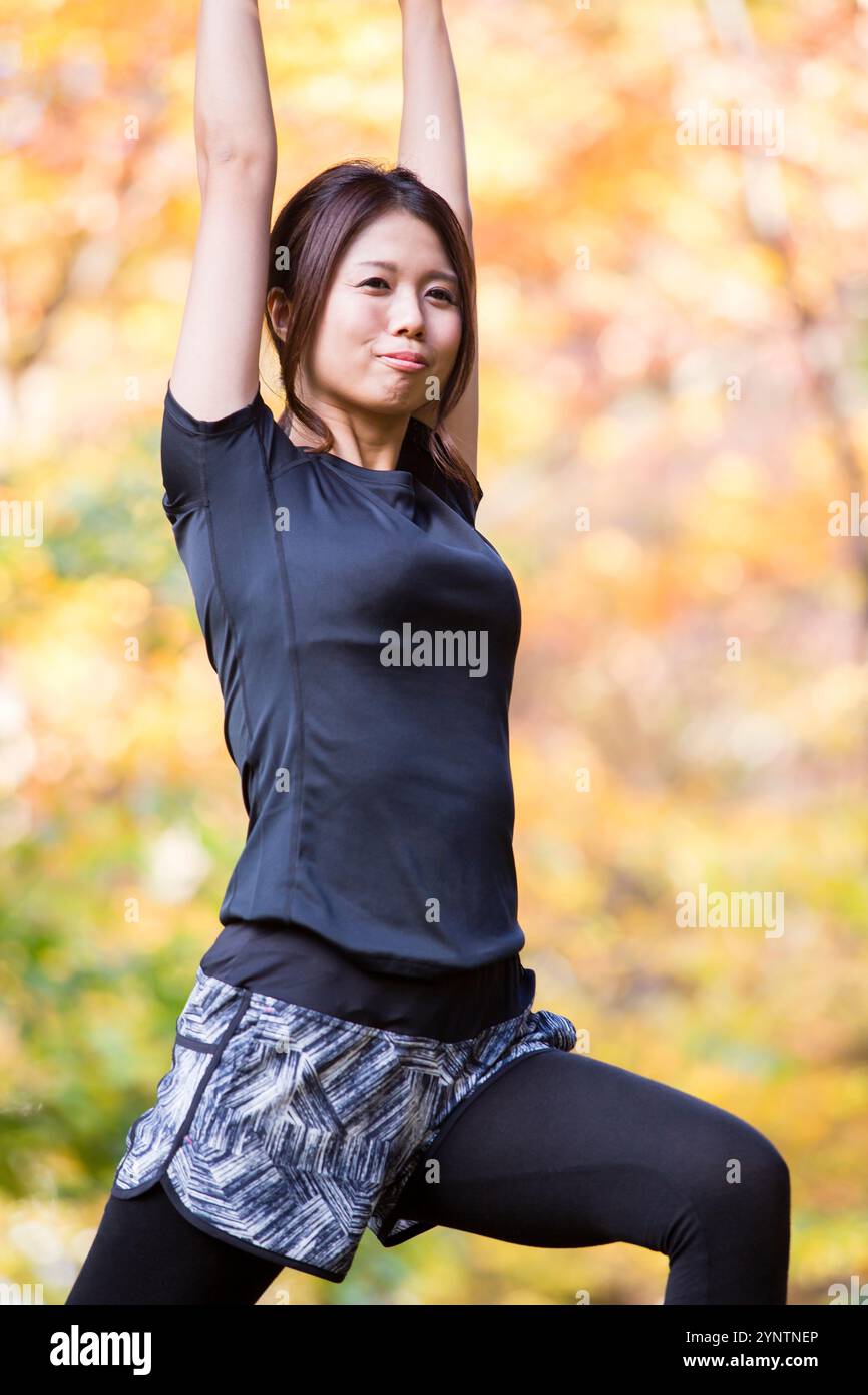 Donna in abbigliamento sportivo Foto Stock