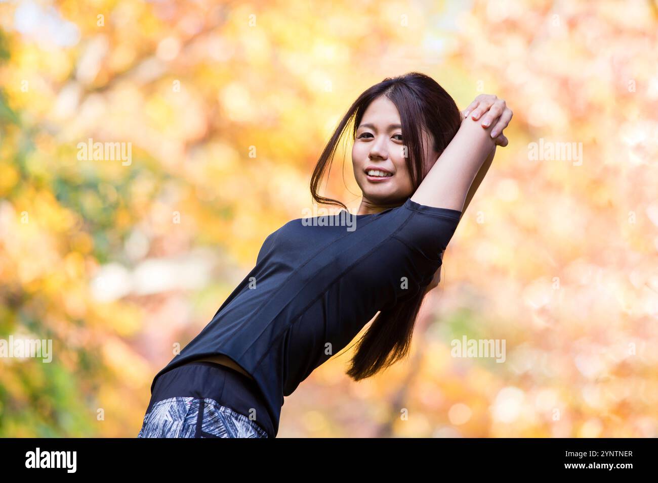 Donna in abbigliamento sportivo Foto Stock