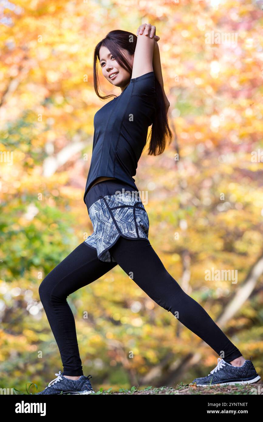 Donna in abbigliamento sportivo Foto Stock