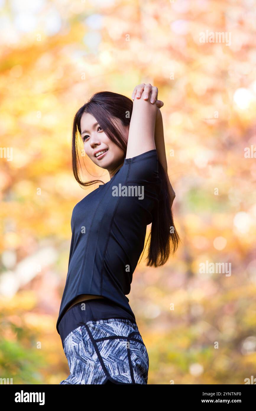 Donna in abbigliamento sportivo Foto Stock