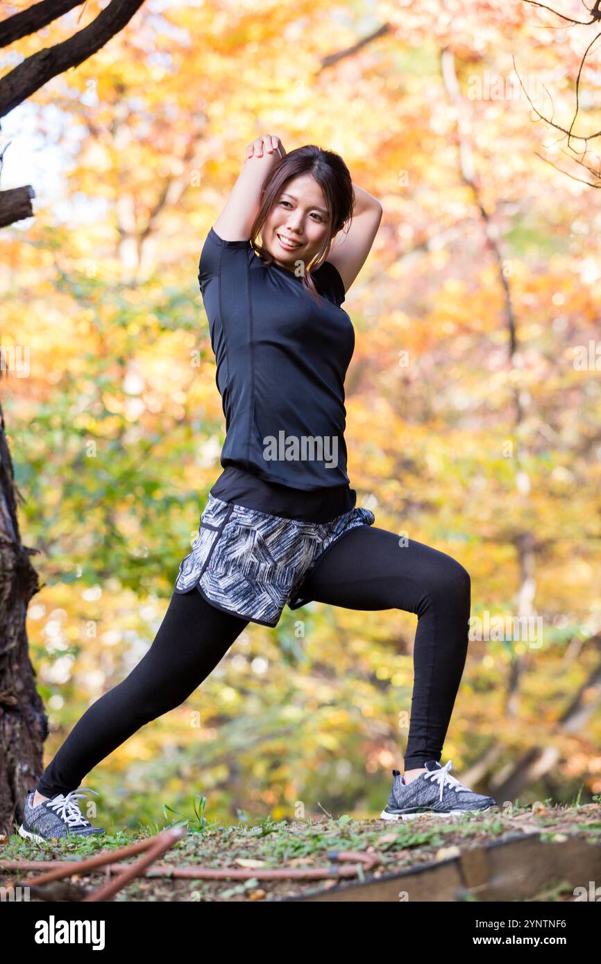 Donna in abbigliamento sportivo Foto Stock