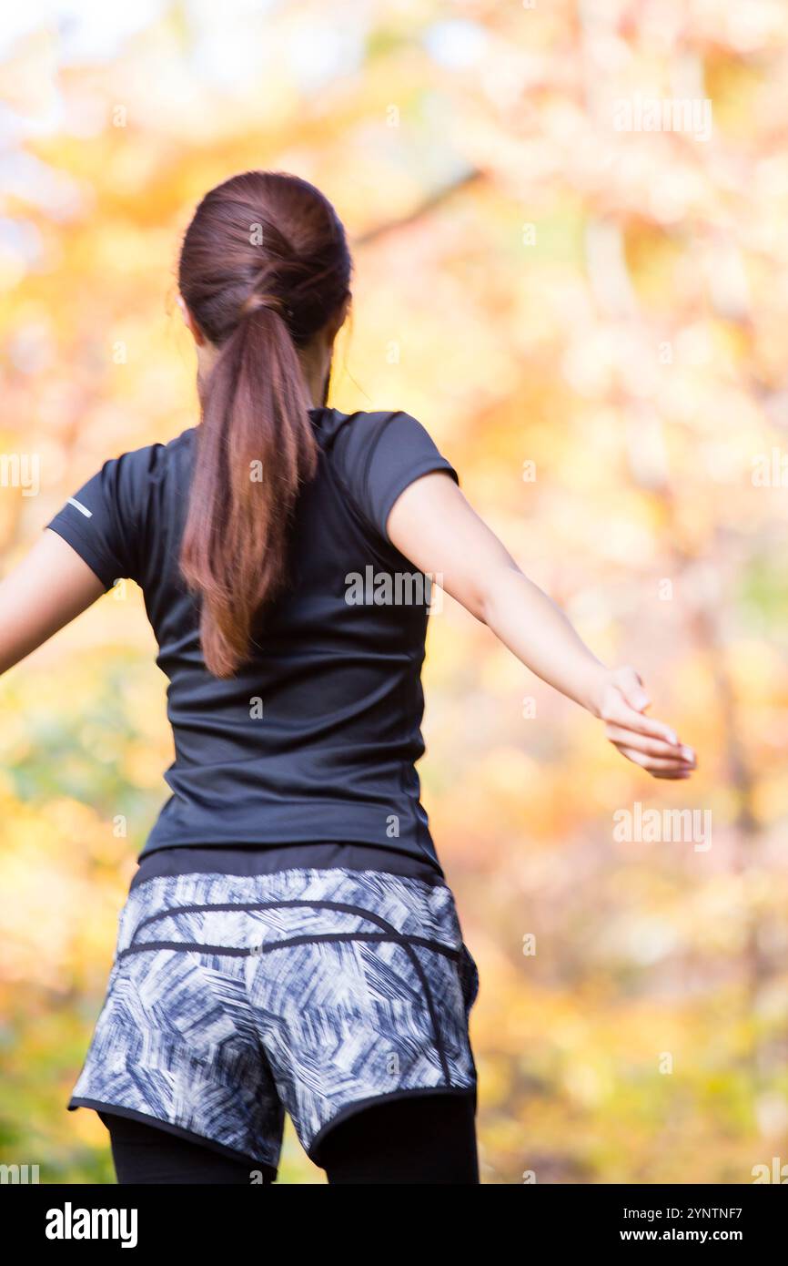 Donna in abbigliamento sportivo Foto Stock