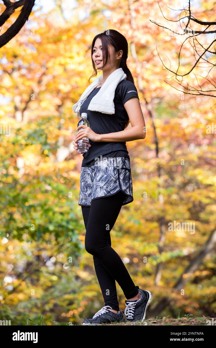 Donna in abbigliamento sportivo Foto Stock