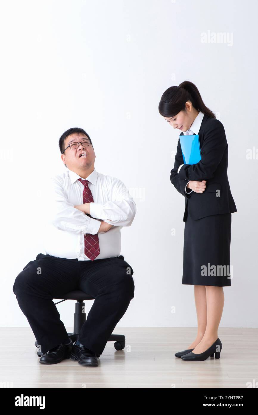 Boss e subordinato Foto Stock