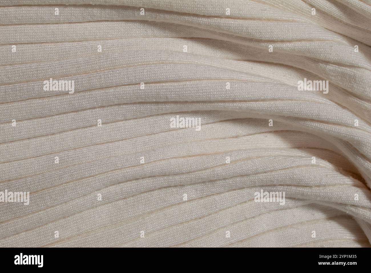 Pullover in maglia beige. Concetto di background Foto Stock