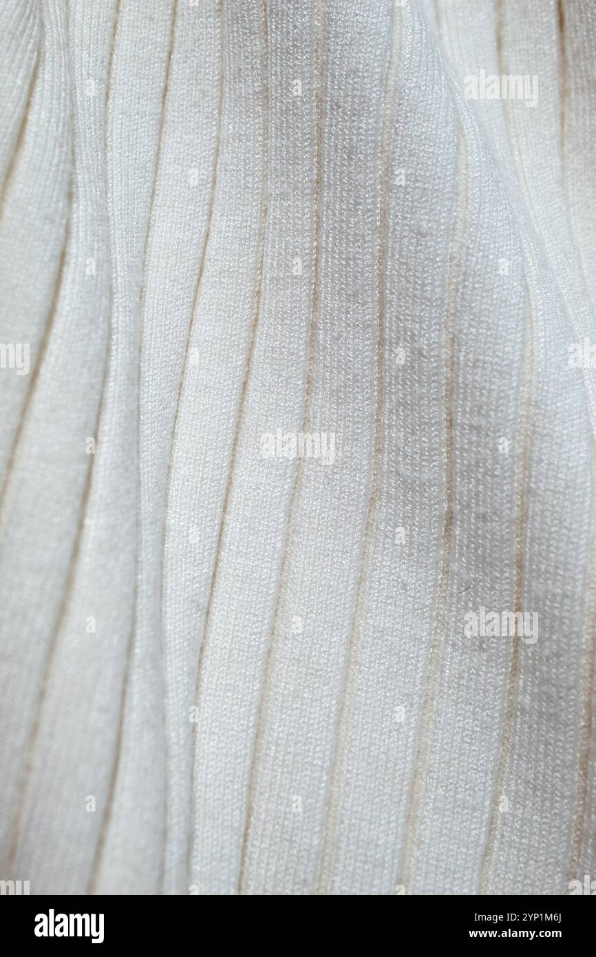 Pullover in maglia beige. Concetto di background Foto Stock