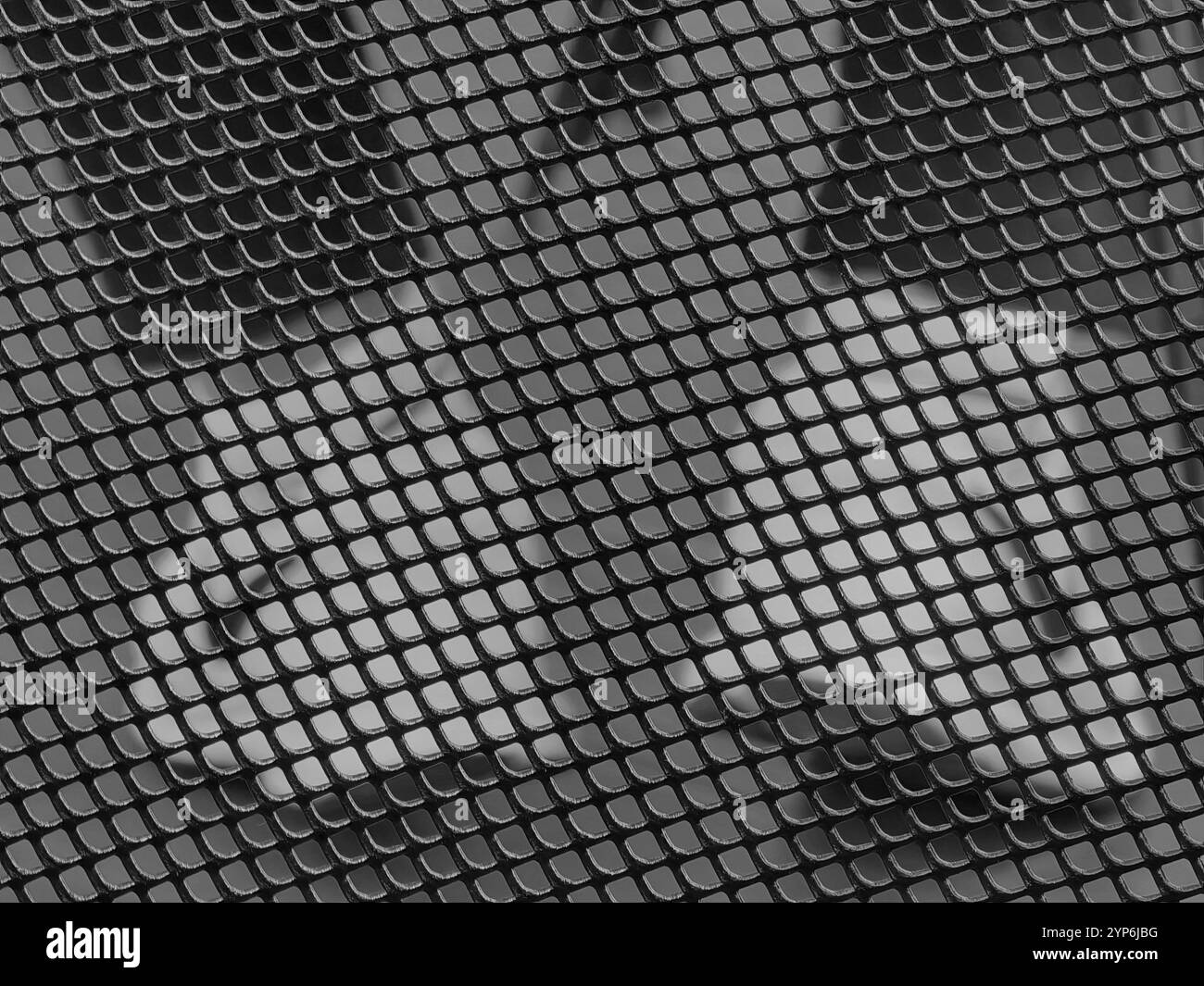 Incorniciato dal design: Sneaker Nike White attraverso Metal Grid Foto Stock