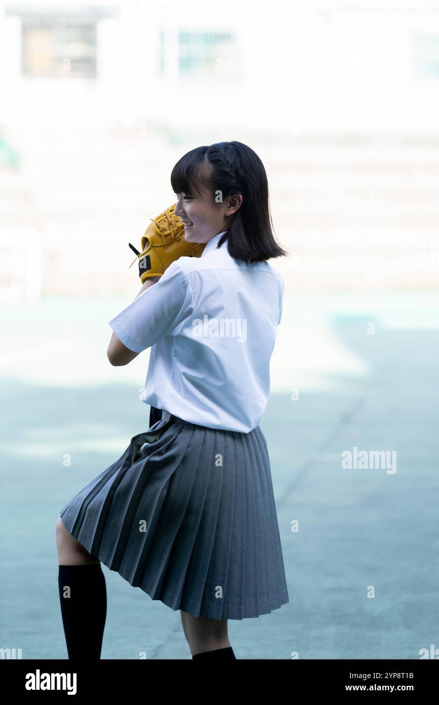 Studenti delle scuole superiori che giocano a baseball Foto Stock