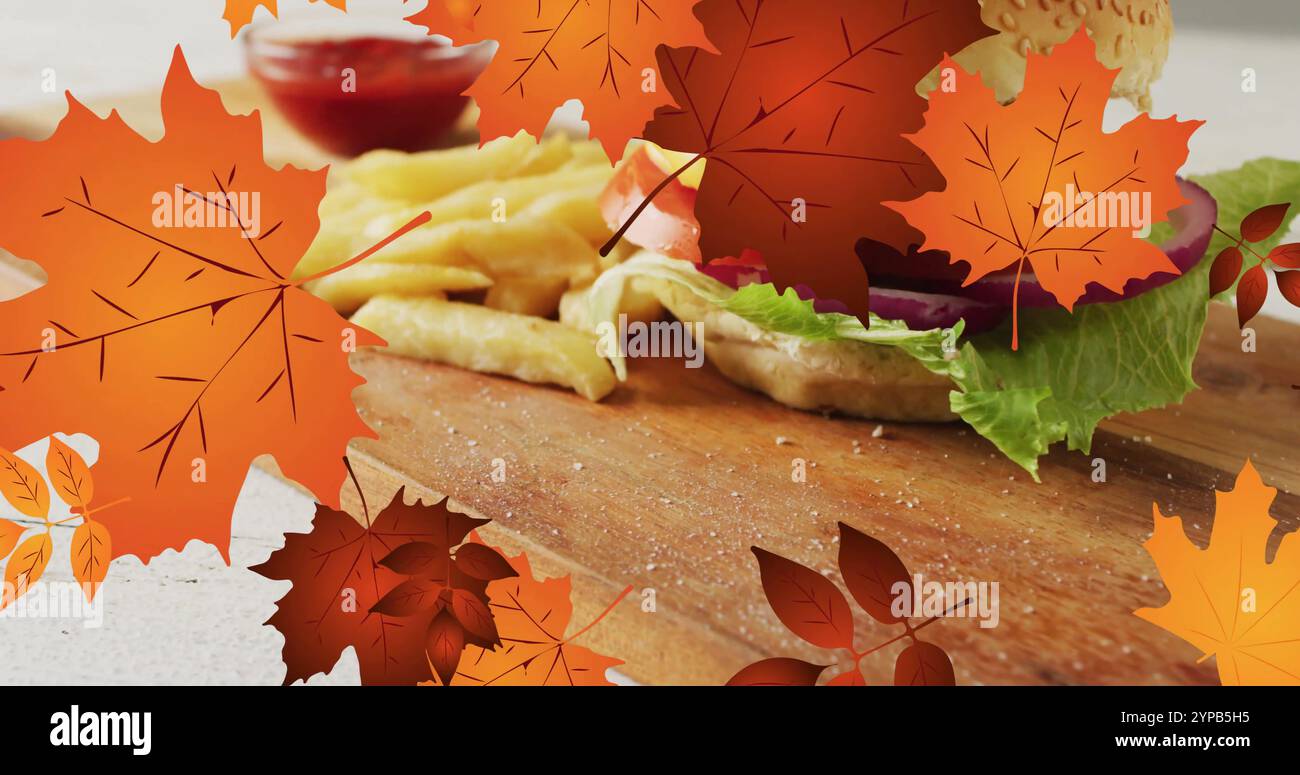 Immagine della cornice con foglie di caduta sull'hamburger Foto Stock