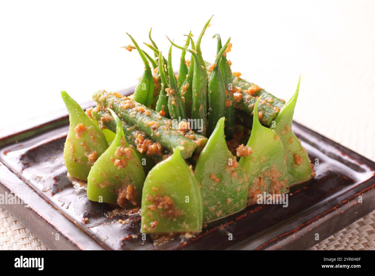 Fagioli con condimento con semi di sesamo Foto Stock