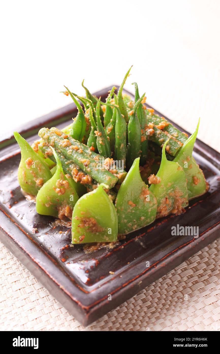 Fagioli con condimento con semi di sesamo Foto Stock