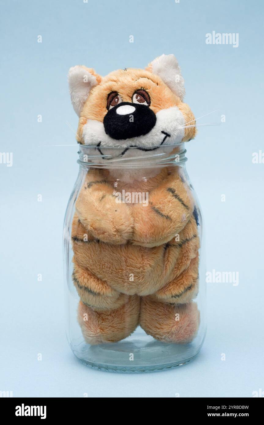 Toy animale in un barattolo di vetro Foto Stock