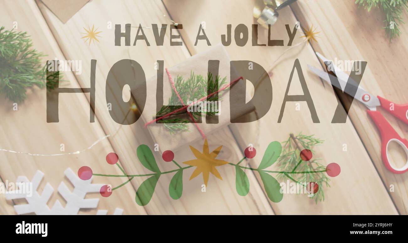 Indossate un'immagine di testo per le feste sulla confezione regalo di Natale con decorazioni natalizie Foto Stock