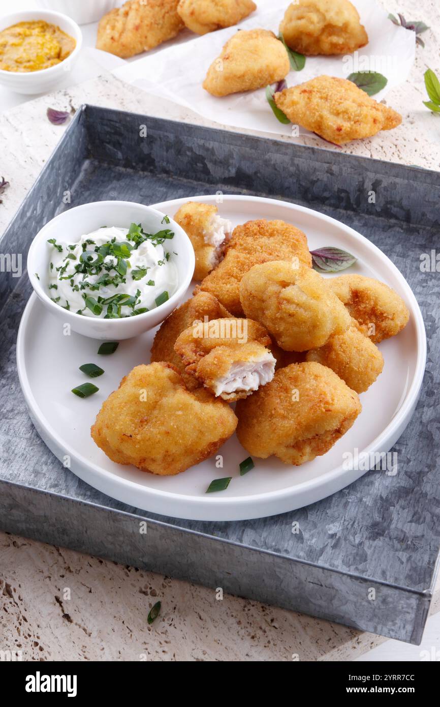Pepite di pesce con tuffi Foto Stock