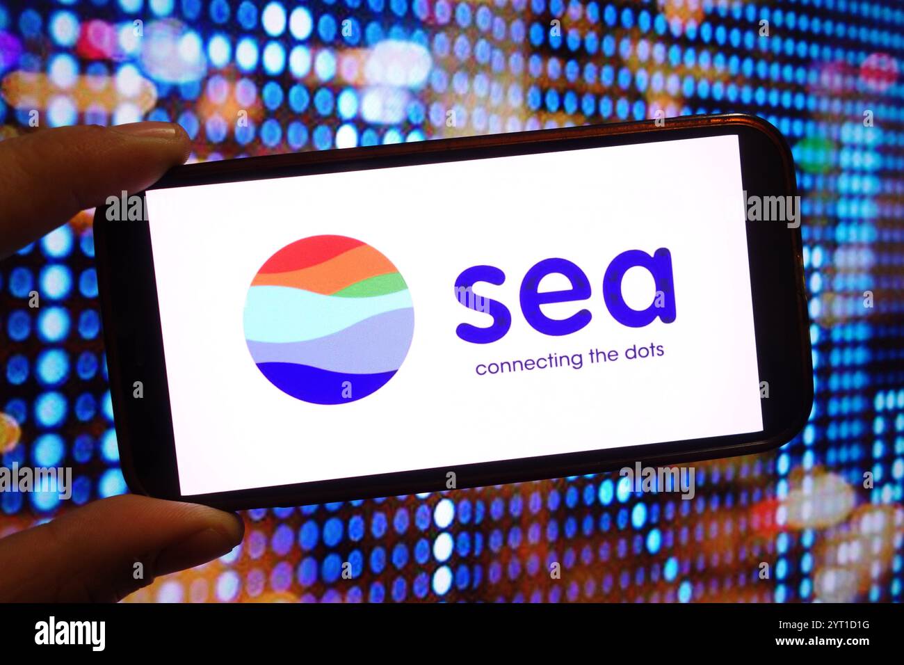 In questa immagine, il logo Sea Company viene visualizzato sullo schermo di uno smartphone. Foto Stock