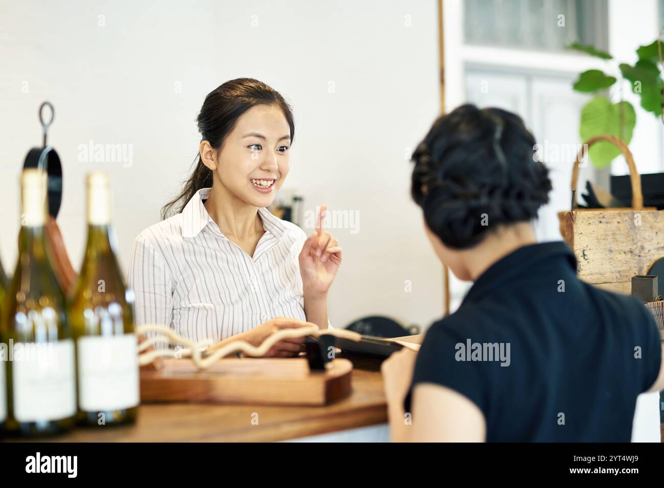 Personale del ristorante e clienti Foto Stock