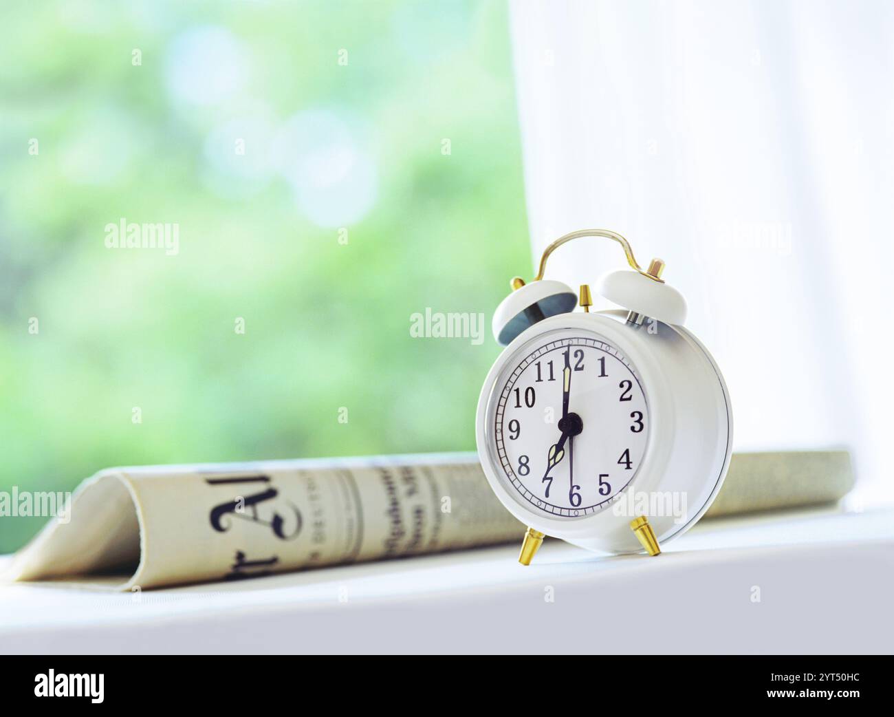 Sveglia e quotidiano Foto Stock