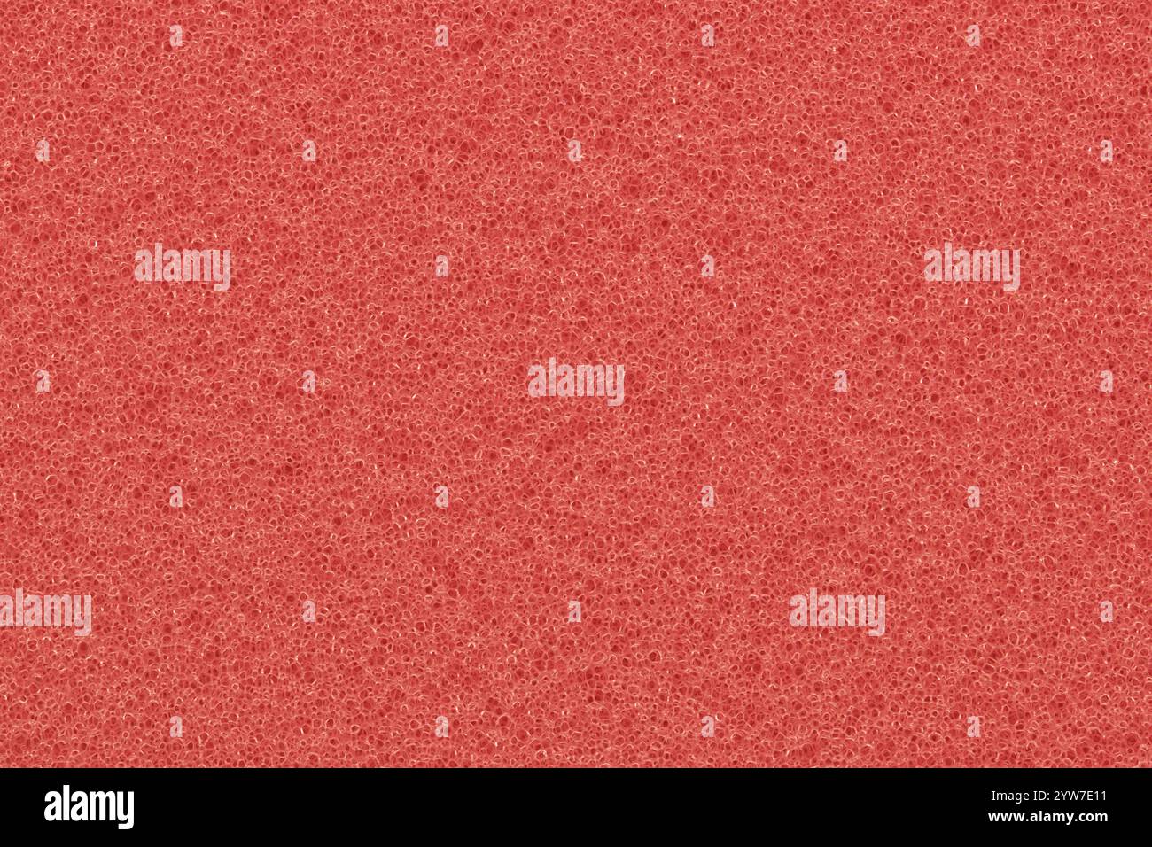 Sfondo in schiuma rosa anguria materiale da imballaggio in spugna porosa di un colore. Foto Stock