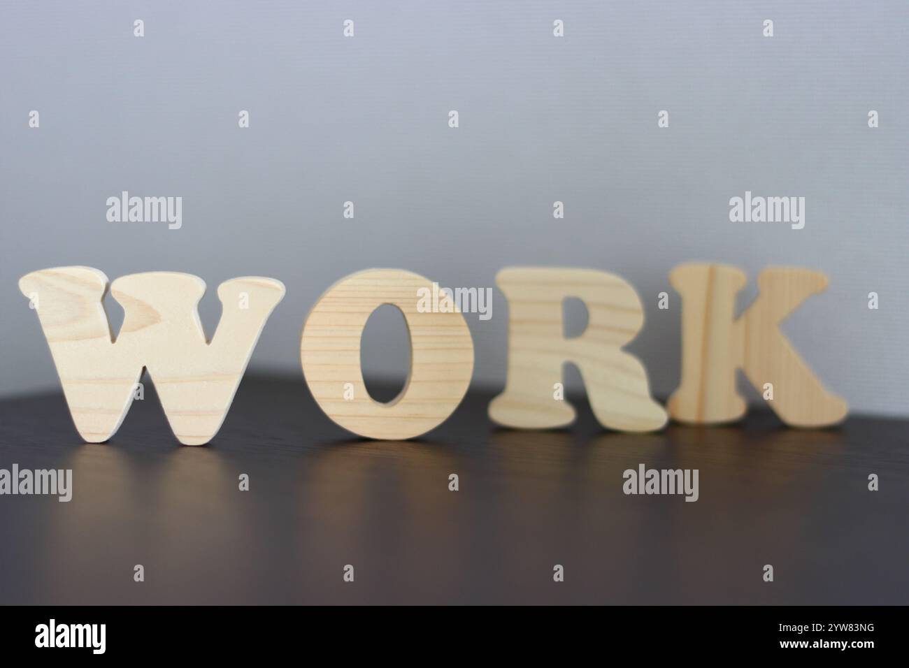 Blocchi di legno che rappresentano la parola LAVORO Foto Stock
