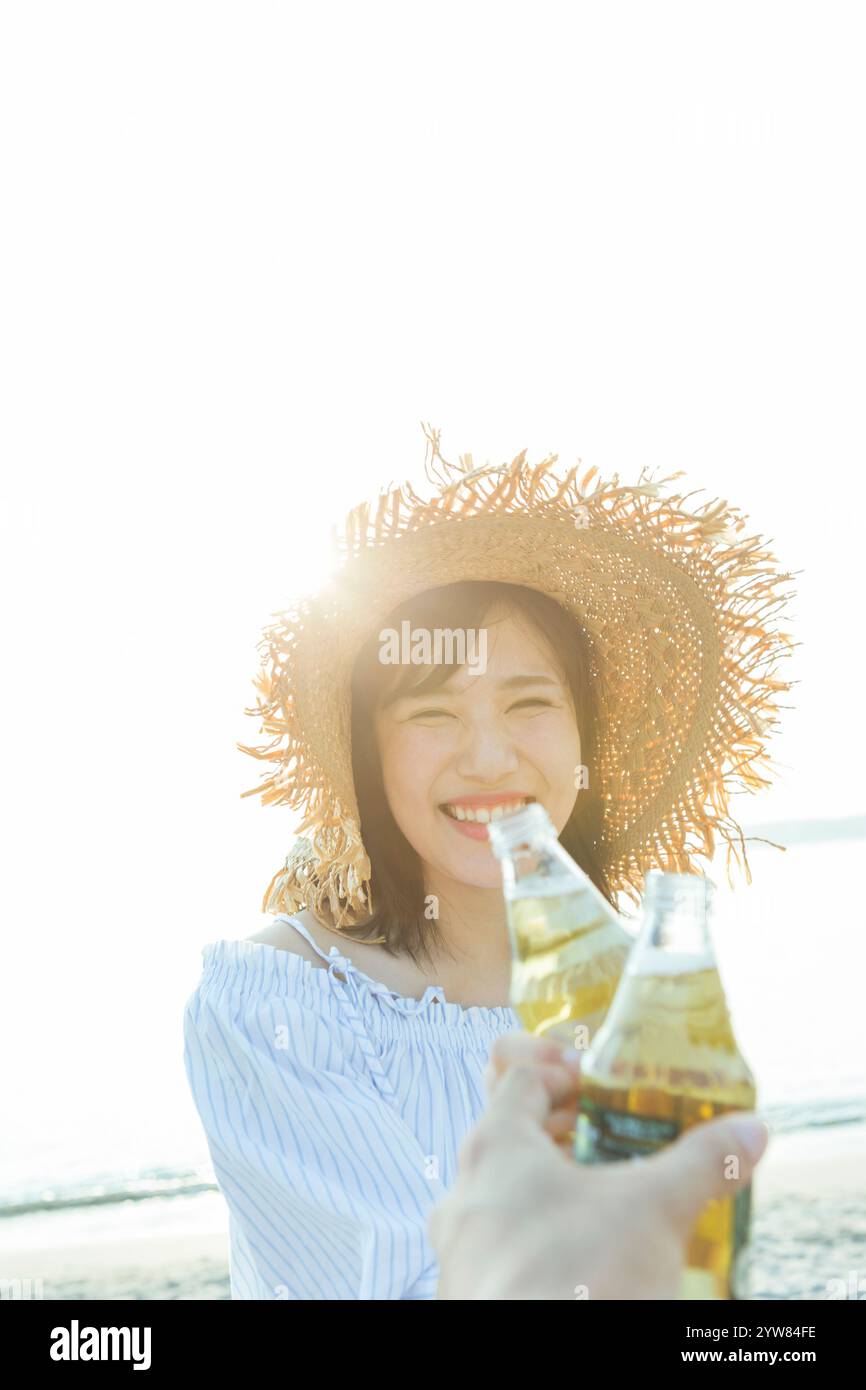 Donna che tosta Foto Stock