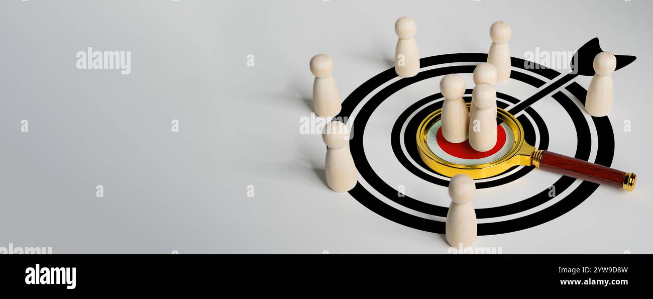 Lente d'ingrandimento focalizzata sull'icona del manager, che è tra le icone del personale per la leadership nel reclutamento dello sviluppo umano e il concetto del gruppo target del cliente. Crea Foto Stock