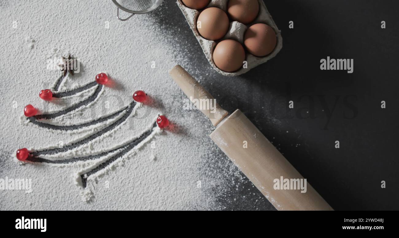 Una scena di cottura natalizia si apre su un bancone della cucina Foto Stock