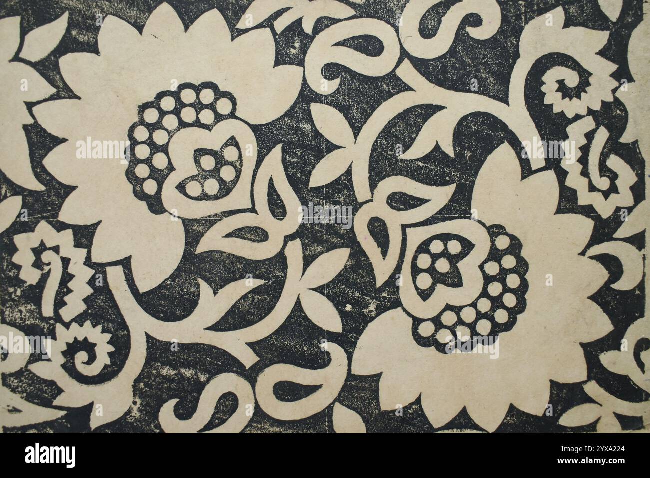 Design in tessuto vintage indiano stampato a blocchi di fiori e foglie su carta Foto Stock