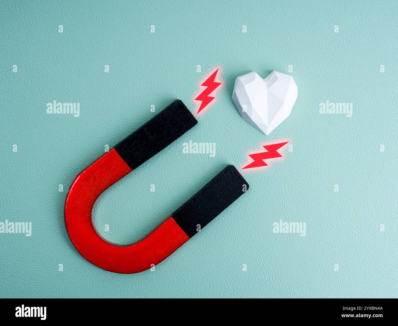 Magnete a forma di U, colori nero e rosso con icona scintillante, potenza che attira il bianco dal cuore forte, isolato su sfondo azzurro. Amore astratto, io Foto Stock