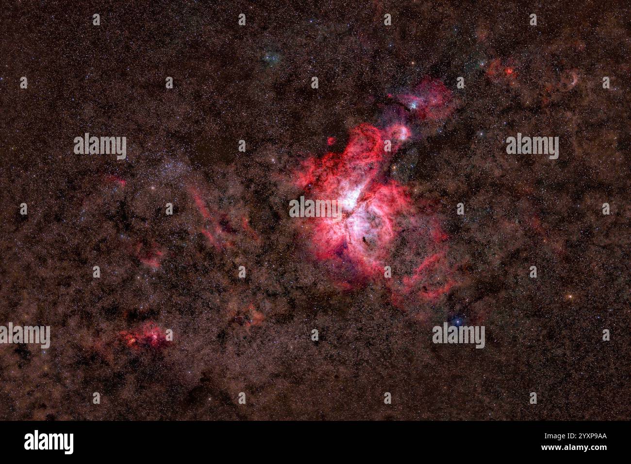 La grande Nebulosa carina e la nebulosità scura nella costellazione carina. Foto Stock