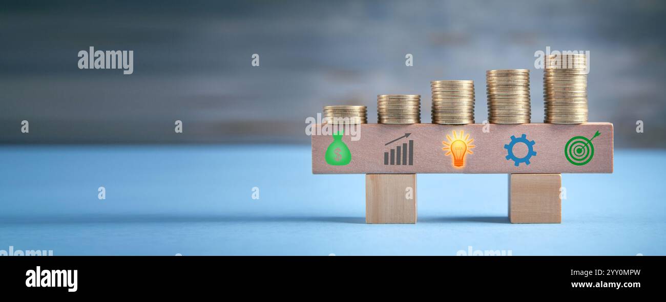 Simboli commerciali su blocco di legno. Processo aziendale. Obiettivo. Risultato Foto Stock