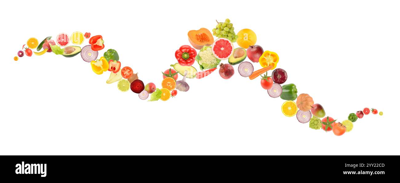Caduta di frutta e verdura sotto forma di onda isolata su sfondo bianco. Foto Stock