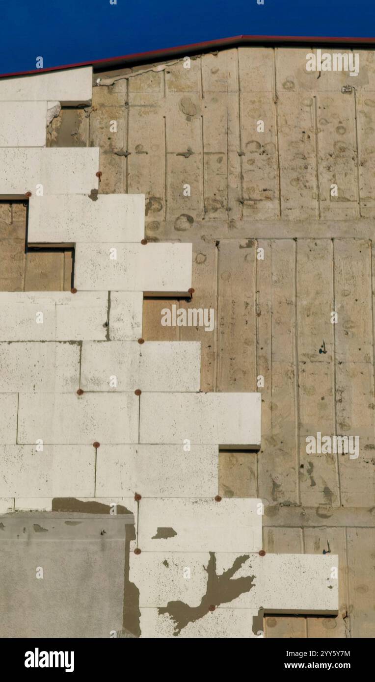 Dismantled Wall: Un puzzle di scarsa artigianalità Foto Stock