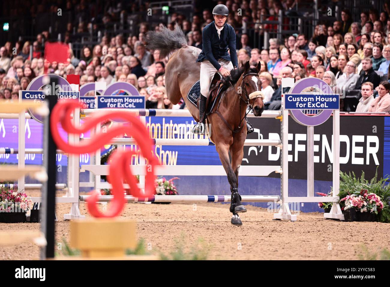 Londra, Regno Unito. 20 dicembre 2024. Gregory Wathelet del Belgio con Double Jeu d'Honvault durante il Gran Premio di Londra al London International Horse Show il 20 dicembre 2024, Londra, Regno Unito (foto di Maxime David - MXIMD Pictures) crediti: MXIMD Pictures/Alamy Live News Foto Stock