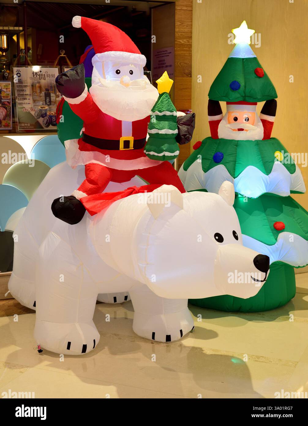 Babbo Natale e Babbo Natale Clais sull'orso polare Foto Stock