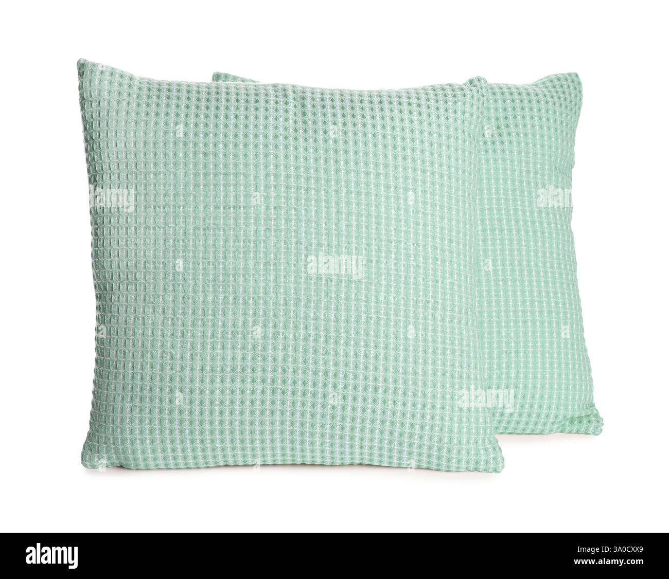 Cuscini di colore verde isolati su bianco Foto Stock