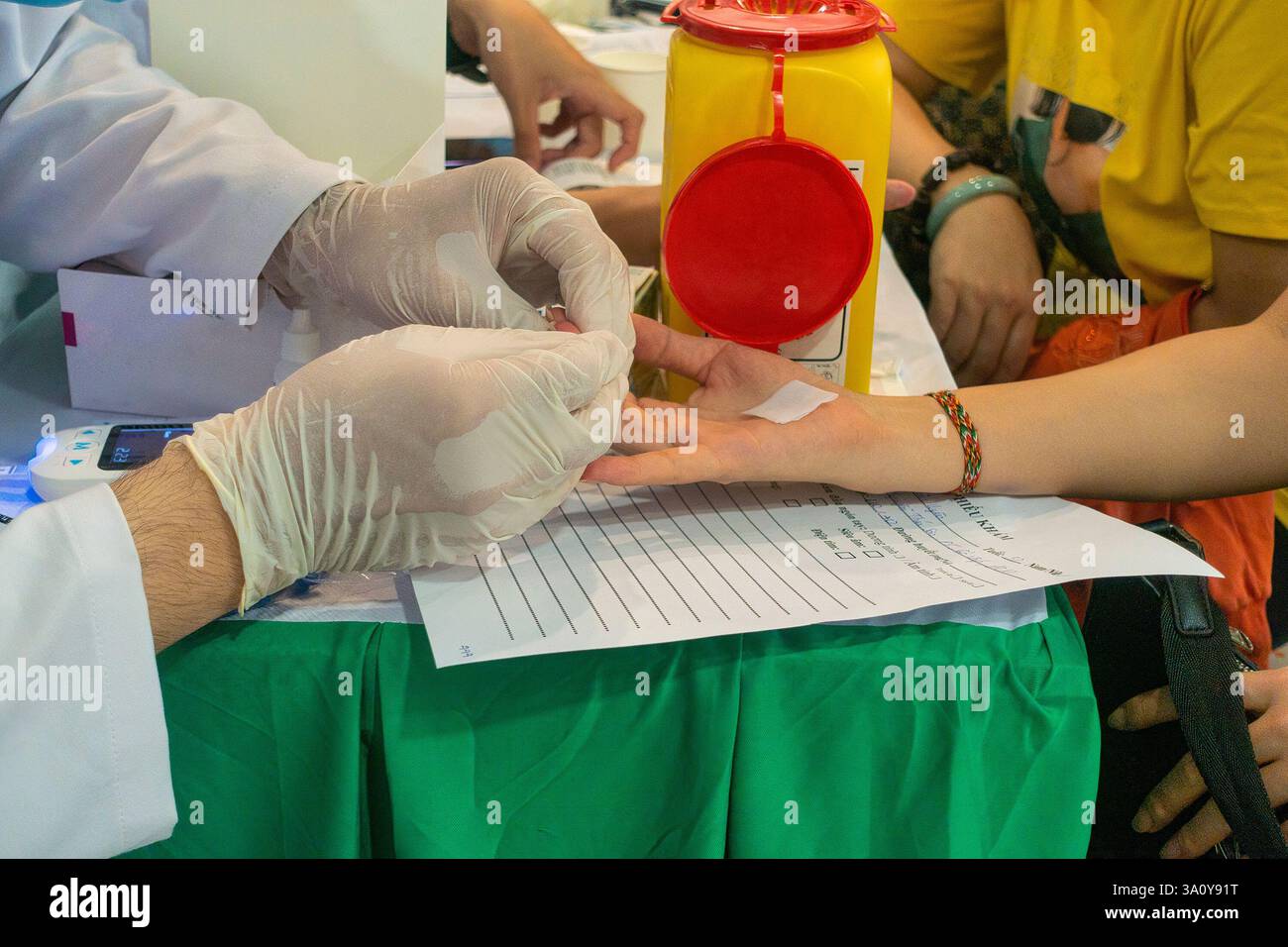 Esame sanitario comunitario a ho chi Minh City, Vietnam Foto Stock