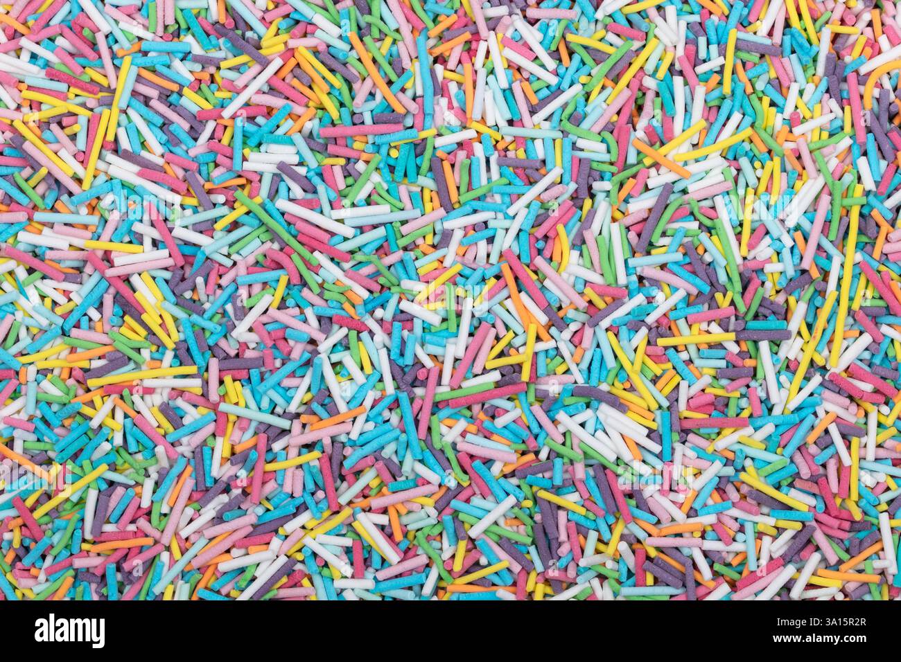 Vibrant Rainbow Sprinkles Mix - decorazioni colorate di pasticceria con Jimmies e Perle di zucchero per cuocere, dessert e dolciumi Foto Stock